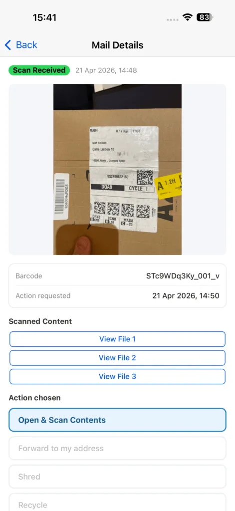 An item record in the Traizr mobile app, showing the scan received status with its timestamp, the photograph captured of the parcel label, and the barcode recorded against the item